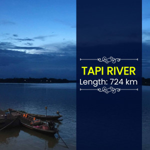 Image of Tapi River with boats at dusk