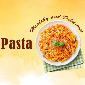 A plate of colorful pasta with tomato sauce and basil.