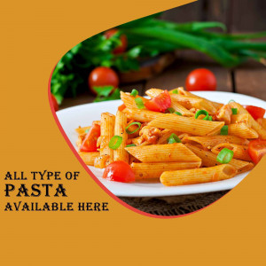 Close-up of a plate of pasta with tomato sauce and fresh herbs