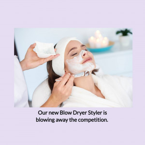 Woman receiving a facial treatment at a spa with a white mask applied.
