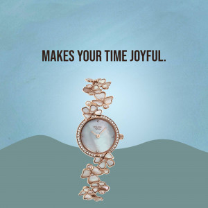Rose gold Titan Raga Aura watch with butterfly motifs on a light blue background.