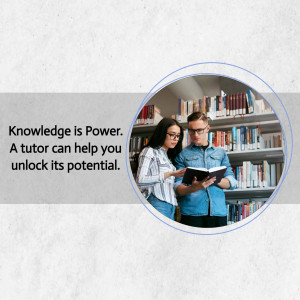Two students studying with a tutor in a library