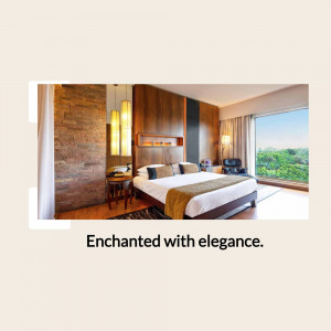 Elegant hotel room with a king-size bed and a view of lush greenery.
