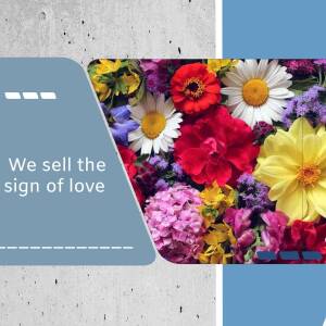 A vibrant bouquet of colorful flowers with text 'We sell the sign of love'