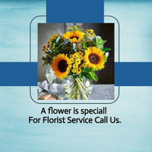 A vibrant bouquet of sunflowers and other yellow flowers in a vase with a glass of champagne.