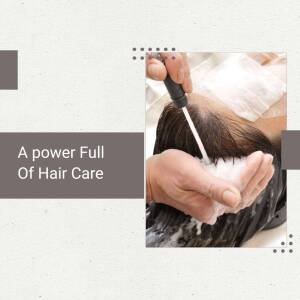 Close-up of a hair stylist giving a client a scalp treatment with a jet spray.