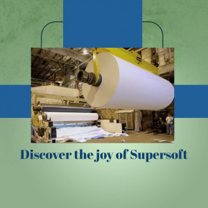 Large roll of white paper being manufactured in a factory