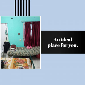 A simple bedroom with two single beds and a teal wall.