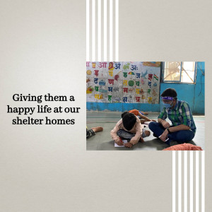 A volunteer assisting children at a shelter home with drawing.