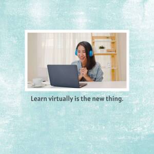 Woman using laptop with headphones for online learning