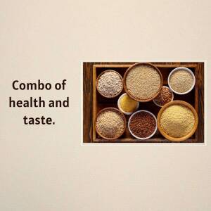 A wooden tray filled with various types of grains.