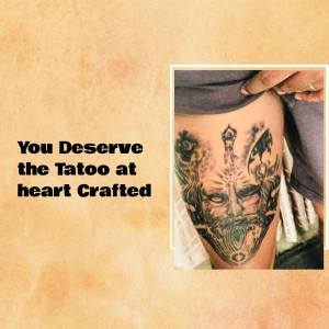 Close-up of a detailed tattoo on a person's thigh