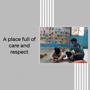 Two children and a teacher interacting in a classroom setting.