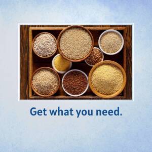 Overhead shot of various grains in wooden bowls on a wooden tray