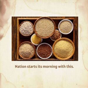 Top-down view of various grains like quinoa, millet, and couscous arranged in wooden bowls on a dark wooden tray.