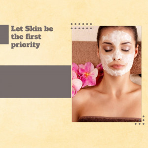 Woman with a facial mask applying skincare