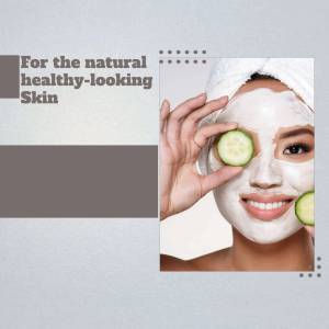 Woman with a cucumber facial mask