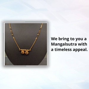 Close-up of a gold mangalsutra necklace on a display bust.