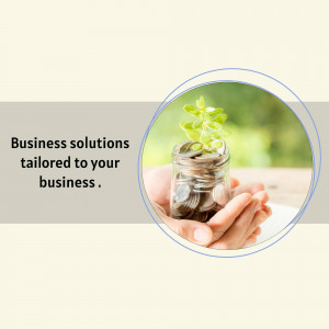 Hand holding a glass jar with coins and a small plant growing inside, symbolizing business growth and financial solutions.