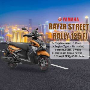 Yamaha RayZR Street Rally 125 FI scooter in orange and black against a city backdrop