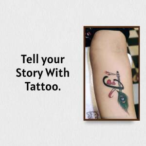 Close-up of a tattoo on a person's arm with text overlay