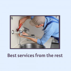 Plumber repairing a faucet under a sink