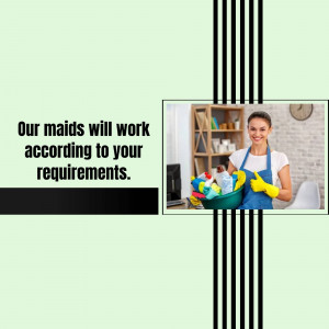 Smiling maid holding cleaning supplies in a home setting