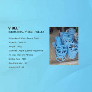 Stack of blue industrial V belt pulleys made of cast iron