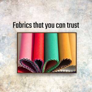Assortment of colorful fabrics with the text 'Fabrics that you can trust'
