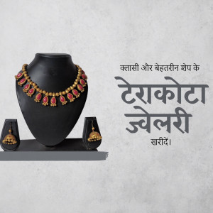 Close-up of terracotta jewellery set on a black bust