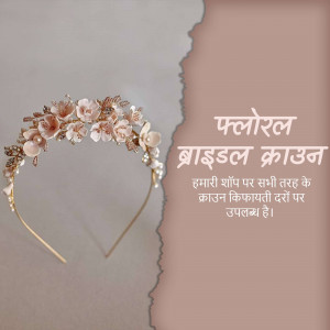 Close-up of a delicate floral bridal crown with pearl accents on a light pink background.