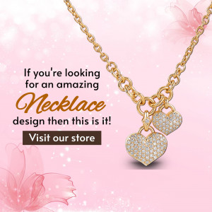 Close-up of a gold necklace with heart-shaped pendants.