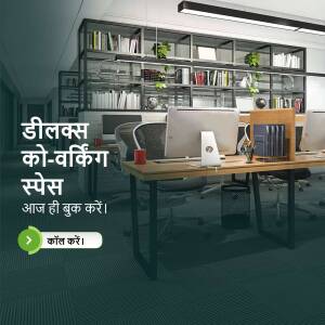 A well-lit, modern coworking space with desks, chairs, and shelving.
