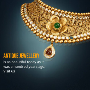 Close-up of an antique gold necklace with intricate floral design and gemstones.