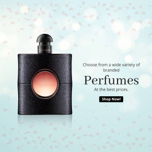 Black perfume bottle with pink accents on a light blue background with floral elements.