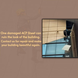 Close-up of a damaged ACP sheet on a building facade with repair service advertisement.