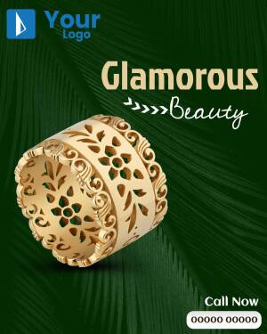 Close-up of a gold ring with intricate floral design on a dark green leaf background.