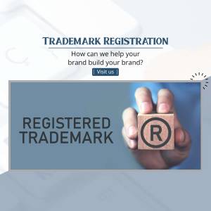Image depicting trademark registration with hands holding a block with a registered trademark symbol.
