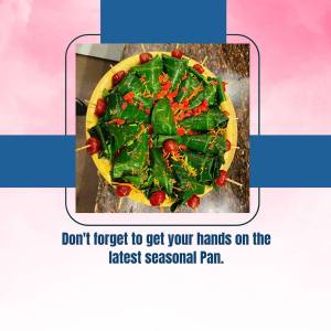 Close-up of a beautifully arranged Pan dish with vibrant green betel leaves and red toppings.