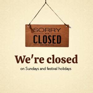 Wooden sign saying 'Sorry We're Closed' hanging from a string.