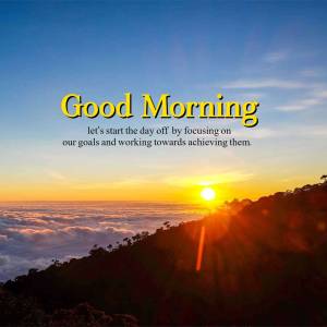 Sunrise over mountains with 'Good Morning' text
