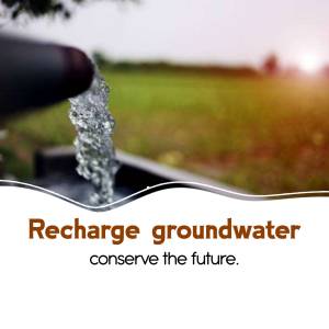 Water flowing from a pipe onto green grass with text 'Recharge groundwater conserve the future.'
