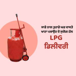 Red LPG gas cylinder with a wheeled trolley, with text in Punjabi and English.