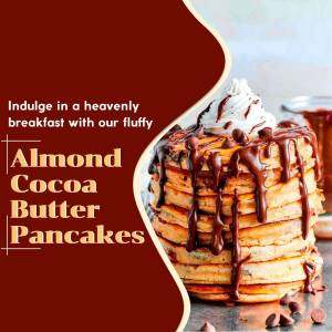 A stack of almond cocoa butter pancakes drizzled with chocolate sauce and topped with whipped cream and chocolate shavings.