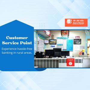 Interior view of a Bank of Baroda Customer Service Point in a rural area.