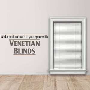 White Venetian blinds installed in a window frame