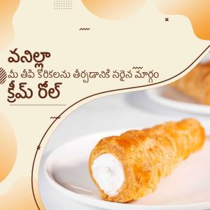 Close-up of a golden brown vanilla cream roll on a white plate.