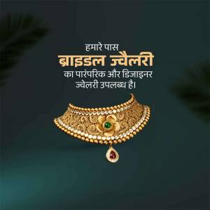 Close-up of a gold bridal necklace with intricate design and a green gemstone.