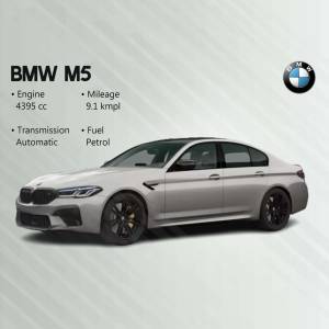 Side view of a grey BMW M5 sedan with key specifications listed.