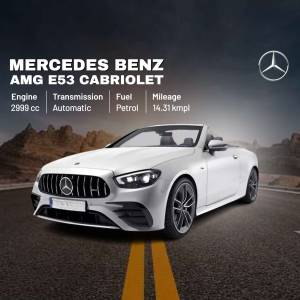 White Mercedes-Benz AMG E53 Cabriolet on a road with a desert background